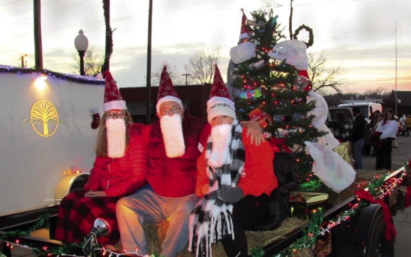 Cushing Pride members Marie Thackray, Richard Thackray, and Director Laura Green braved the cold and was rewarded with the Mayor’s Choice Grand Prize Santa Trophy with their “Trashy Tree” during the Chamber’s annual Christmas parade.