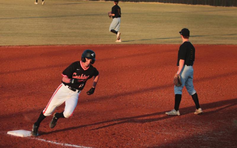 Connor Pritchett turns the corner for home.