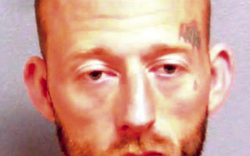 Man arrested with alleged stolen car in Cushing
