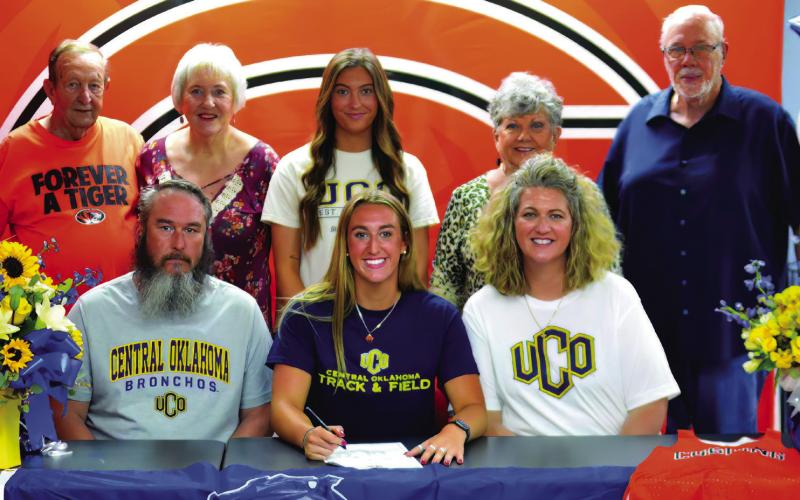 Senior Cushing Tiger athlete Karly Clemons recently signed a letter of intent to run track for the UCO Broncho track and field team.Joining Carly at the signing event were, back row from left, grandparents Cliff and Vickie Case, cousin Jaylee Matthews and grandparents Joy and Don Kindley. Front row from left, father Gunn Clemons, Karly Clemons and mother Crissy Kindley.
