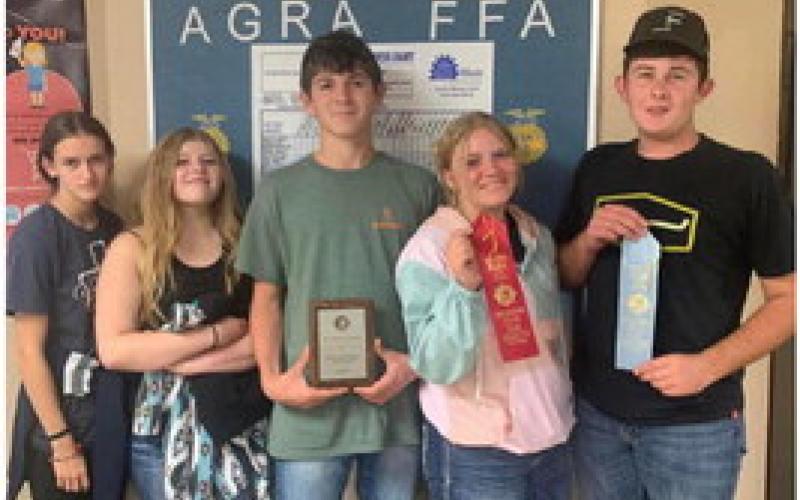 Students from Agra FFA competed in the Oklahoma State Fair’s, dairy judging contest. The team placed second, with Chase Imry being the 10th high individual. They are, from left, Sara Selcer, Cassidy Duplissey, Jesse Rodgers, Mallory Poteet and Chase Imry.