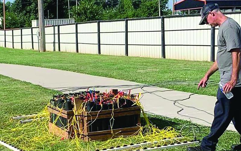 James Blevins triple checks the firework display wiring in preparation of the July 4 presentation put on by the Cushing Fire Department annually. Photo Courtesy Mark Beitz