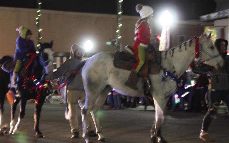 Dove Properties, LLC/Dove Construction rode their way into 2nd place in the walking category during the Cushing Chamber Christmas parade that was held this past Saturday on Dec. 13.