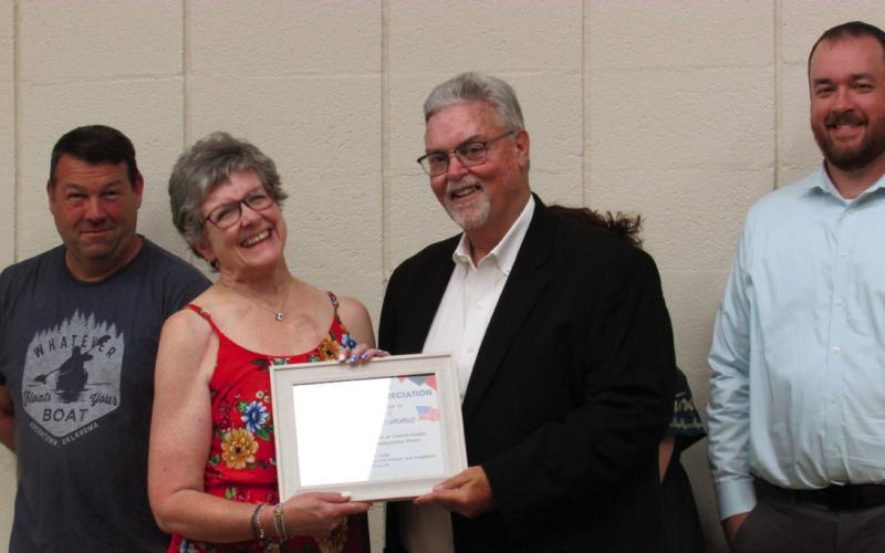 Deyana Simma was presented with an appreciation certificate for her role as the director of the All-American Community Choir that performed during the July 4 event. Photos by DeAnna Maddox