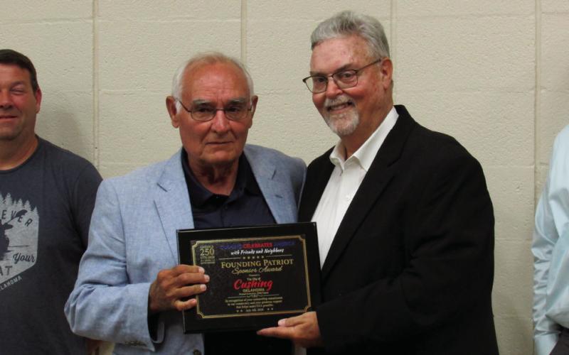 Mike Kennedy presented the Founding Patriot Sponsor award which Commissioner Ron Lamb accepted on behalf of the City of Cushing.