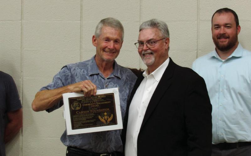A Community Engagement Award was presented to Doug Carson of the Carson Foundation by Mike Kennedy at the Cushing City Hall on July 20.