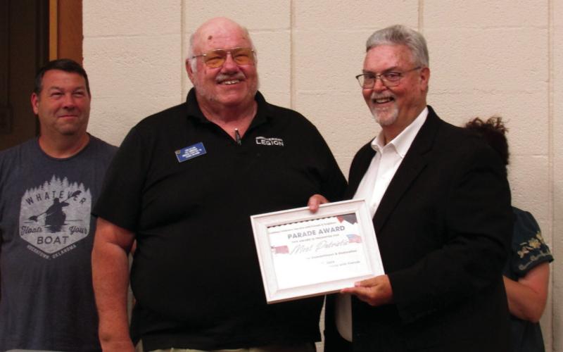 Leon Sullivan was presented with Most Patriotic award for his parade entry with the American Legion Post 108 which displayed a variety of relevant and historical flags through the years.
