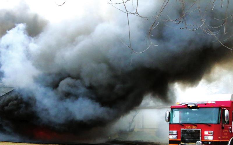 Fire on East Oak destroys three homes