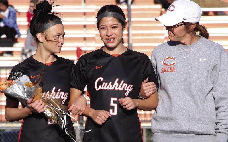 Midfielder for the Lady Tigers, Madeline Armenta is the daughter of Luis Armenta and Elsa Atilano and is escorted by teammate Chloe Shadowen and coach Amber DeLong.