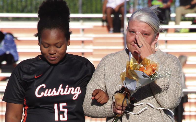 Defense for the Lady Tigers, Sa’Kara Hagler is the granddaughter of Katherine Shinault and is escorted by her aunt, Cindy Shinault.