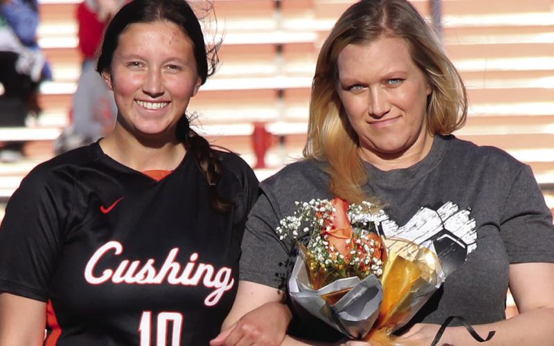Defense for the Lady Tigers, Amber Fausto is the daughter of Ricardo Fausto and Heather Higgins and is escorted by her mom, Heather.