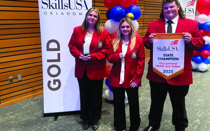 Earning 1st place for Occupational Health and Safety-Multiple Sections for secondary students is (L-R) Keylee Powell, Mannford; Emilee Stephenson, Mannford; Billy Combs, Cushing.