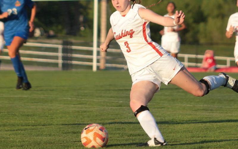 Cushing Lady Tiger Whitney Wood strikes the ball towards the net during the 2023 OSSAA class 4A soccer playoffs vs Oklahoma Christian School in Edmond. Lady Tigers lost to the Saints 6-0. Photo by Allie Prater.