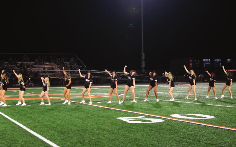 The Cushing Tigers Dance Team strut their stuff at the homecoming game