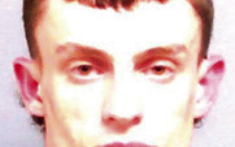 RYAN SCOTT SLINGERLAND — Cushing — Carrying a concealed weapon, traffi cking in illegal drugs