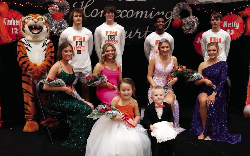 Homecoming Queen Kimberly Dooley, flanked by her court, Killer Tiger Jaylee Matthews, Camden Crooks, Maddie Alexander, Lane Yaunt, Noah Jones, Kelly McBroom and Logan Spradlin. Flower girl and crown bearer are, Raiden Harper and Hudson Thomas Greer.