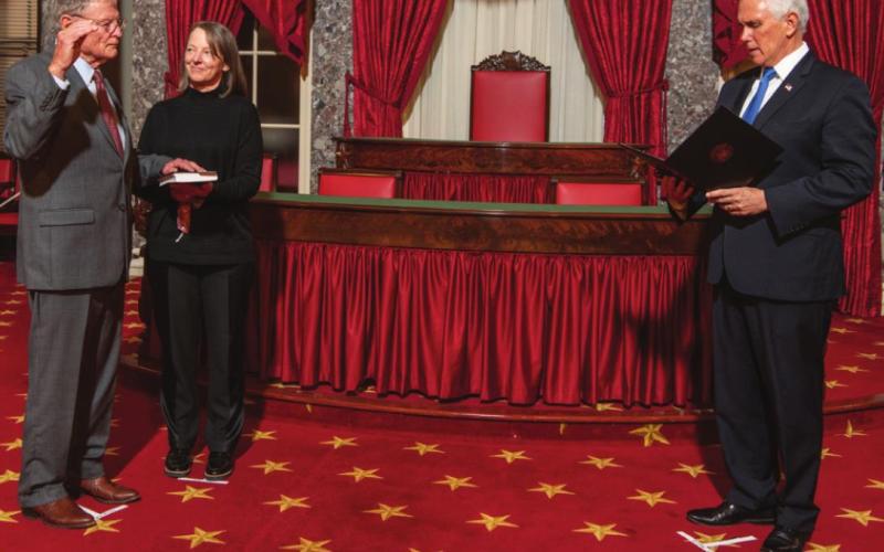 Right: Senator Jim Inhofe is sworn in for the 117th congress, accompanied by his daughter, Molly Rapert.