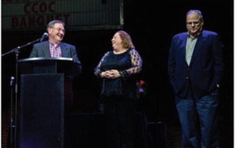 John Moran came to the stage with Amy and Jim to accept the award for the 2024 Non-profit of the Year.