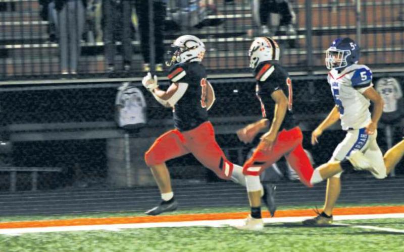 Tigers defeat Harrah in overtime