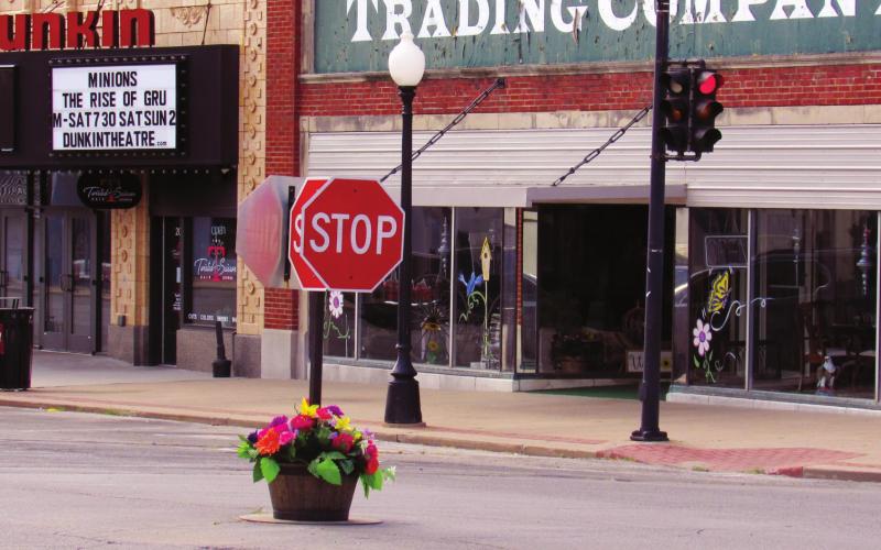 Flower Pot Stop Signs installed on Broadway