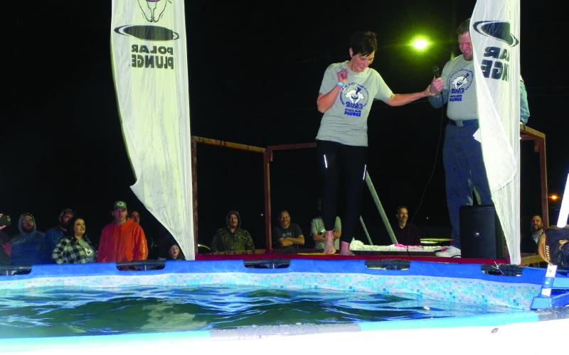 Cheryl Sheldon shows a bit of hesitation as Geoff Beasley goads her into taking the plunge.
