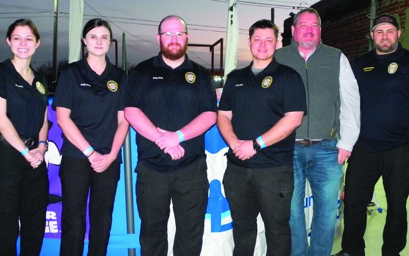 Cushing PD plungers include Heather Snow, Katie Hinkle, David Smith, Jason Beal, Chief Chuck Claxton and Jerrod Livergood.
