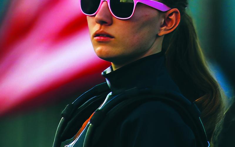 Cushing Tiger Marching Band Percussionist Kira Keyes stays chill while she performs the National Anthem with the band at the start of the Cushing, Oologah football game Friday. Photo by J.D. Meisner