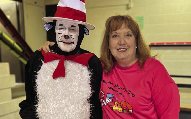 Don McCroskey wearing black, white, and red all over as the beloved Dr. Suess character, The Cat in the Hat, alongside CPK Principal Sally Wright. Picture courtesy of Sally Wright.