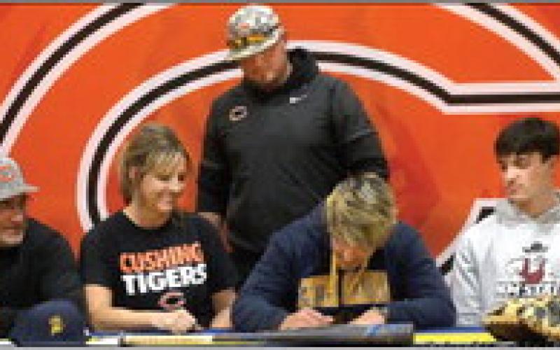 Brody Berlowitz signs his letter of intent to play baseball for the University of Central Okahoma. Photos by Allie Prater.