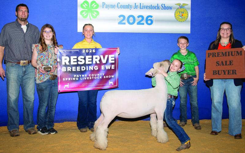 Blaire Mitchell of Cimarron Valley 4-H poses with her Dorset breeding ewe. Mitchell earned Reserve Champion with her Dorset Breeding Ewe in Class 1 and also had multiple placings in swine and gilt classes during the show. Photo by Meagan Stephens.