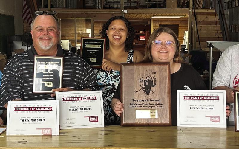 The staff at Cimarron Valley Communications show off some of the hardware they brought home from the Oklahoma Press Association Convention this past weekend. Pictured are, Business Manager and Layout Artist Sapphire Smith, Publisher J. D. Meisner, Lead Reporter DeAnna Maddox, Group Editor Allie Prater and Sports Analyst Robert “Tornado Watch” Marshall. Photo by Raynee Howell
