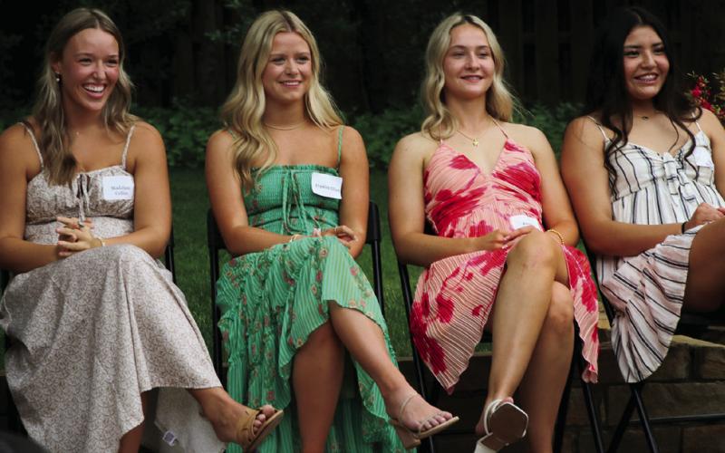 Seniors Maddie Collier, Presley Elliott, Kinsley Williams, and Ella Nanaeto enjoy the fashion show.