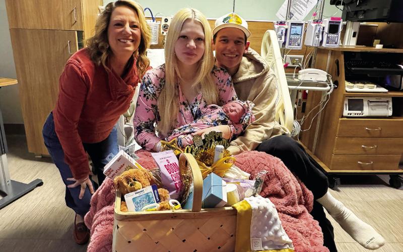 Kammy Peters, director of Women's Health at Stillwater Medical stands with Karrie Tull of Jennings and Braden Morrison of Mannford holding their newborn daughter, Emry Morrison, who was born at 4:40 a.m. Jan. 2 and is the first baby of 2026 at Stillwater Medical. The family was presented with a gift basket from hospital staff to mark the occasion.