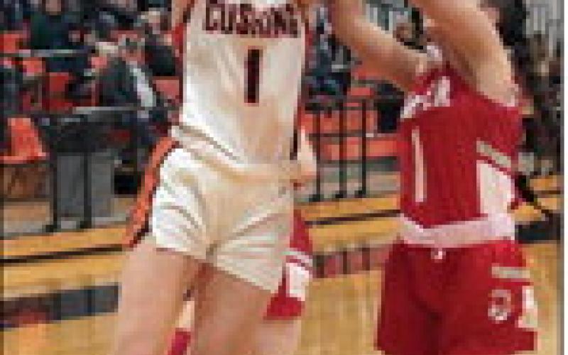 Kinsley Williams goes op fir a transition layup. photo by J. D. Meisner