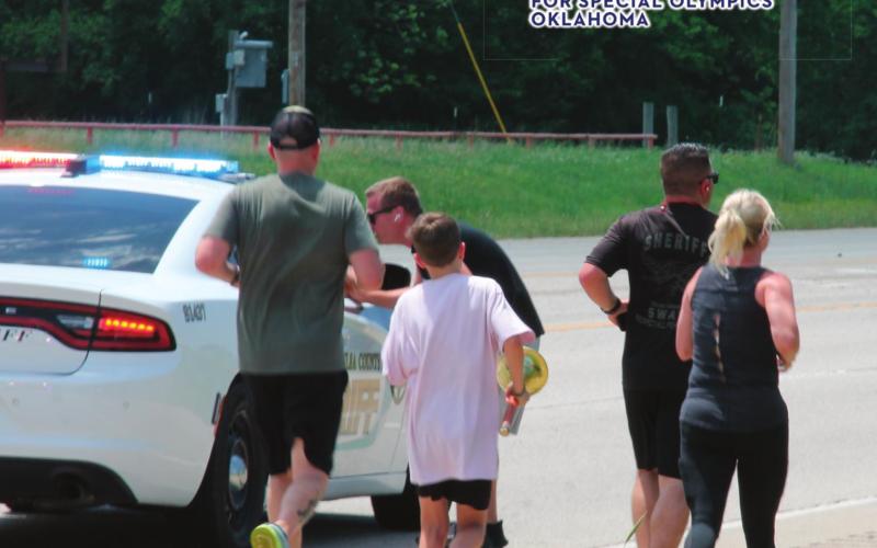 One officer passes the torch