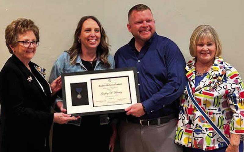 The Cushing Chapter National Society Daughters of the American Revolution (NSDAR) presented the NSDAR Excellence in Historic Preservation Certificate of Award and medal for the preservation of the Dunkin Theater. “Dawn and Geoff Beasley are greatly appreciated for their commitment to our community's historic preservation,” said Sue Cline, Cushing Chapter Historic Preservation chair. Pictured from left, Sue Cline, Dawn Beasley, Geoff Beasley, and Grace Ellsworth Oklahoma State Regent.