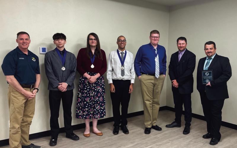 Adult team, 2nd place from L to R: Colonel G. Hall Sebren, Jr.; Cedric Mackey, Hominy; Morgan Kaiser, Drumright; DeVonte Jones, Cushing; Adain Wikel, Ripley; Dustin Ford; Nick Gaunt