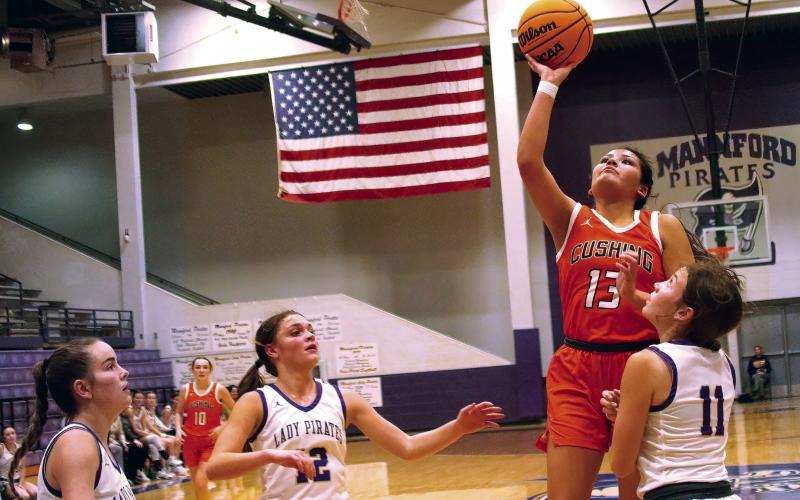 Ella Nanaeto attacks the paint against Mannford. Photos by J. D. Meisner