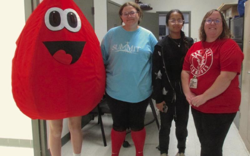 Obi, the blood drop, alongside STUCO members Averi Todd and Lily Haines with their sponsor Lacey Haines. Obi was escorted around Drumright by STUCO member Torin Bray.