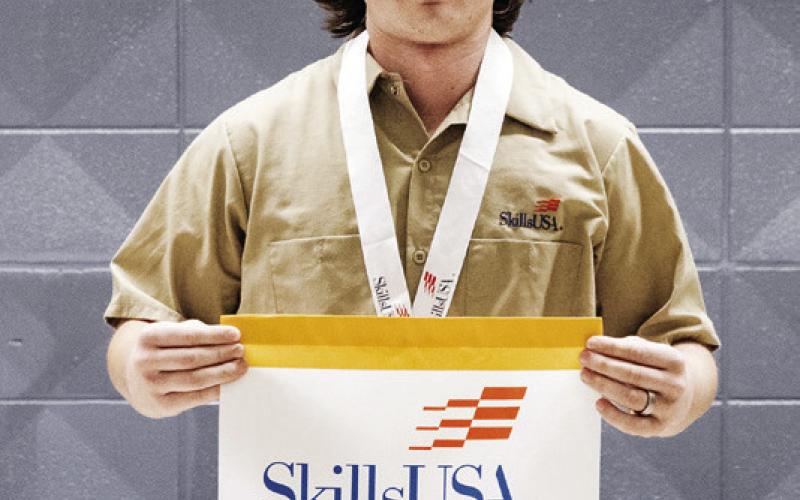 Earning 1 st place in Cabinetmaking for secondary students is Wallace Ocker, Drumright.