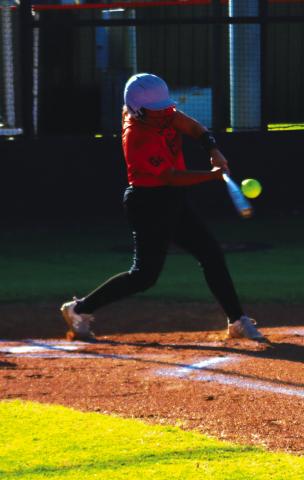 Lady Tiger slugger Ava Heppensberger does what she does best as she makes contact with the ball Thursday. Photo by J. D. Meisner