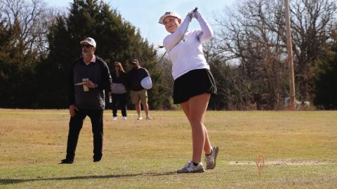 Cushing Lady Tiger freshman Ayla Britt hits a drive from the tee box during the Cushing Girls Spring Invitational Tournament at Buffalo Rock Golf Course Monday, March 24. See story page 7. Photo by Allie Prater.
