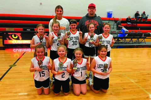 The Cushing Lady Tiger First / Second Grade girls team swept their entire season this year with 11 wins and zero losses