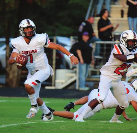 Tiger Quarterback Blaze Berlowitz rolls out in search of an open receiver. He threw for 399 yards.