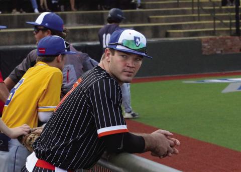 Riley Matheson looks onto the field as he awaits the commencement of the 2023 Oklahoma Baseball Coaches Association All-State game. Matheson finished the game going 1-1 with a single and an RBI and entered the game at catcher in the fifth inning.
