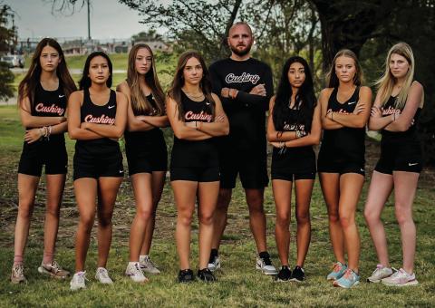 The Lady Tigers tied a school record with their 13th-place finish and Amaya Grant finished third. Pictured are: Grant, Morgan Franklin, Emory Eyler, Melannie Townes, Head Coach Josh Greer, Yohali Medrano, Cora Eyler and Brooklyn Burden. Photos by Sarah Townes