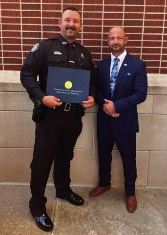 Drumright Police Department congratulated offi cer Brian Niccum on offi cially becoming certifi ed through the Council on Law Enforcement Education and Training (CLEET) on Oct. 24. According to Assistant Chief Mandy Folden, Niccum started with the department in May and has been steadily progressing towards his certifi cation. Niccum served in the Navy for six years prior to joining law enforcement and is currently engaged to the mother of his two year old daughter. Pictured is Niccum holding his certifi cat