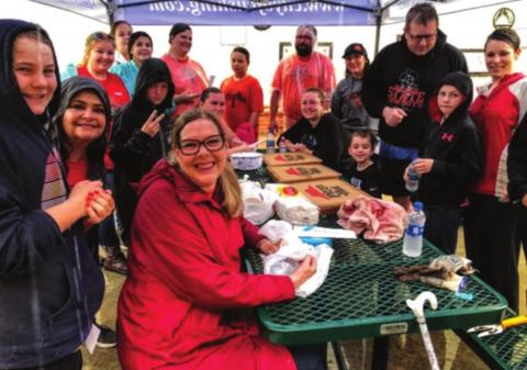 Volunteers were fed pizza prior to braving the elements for.