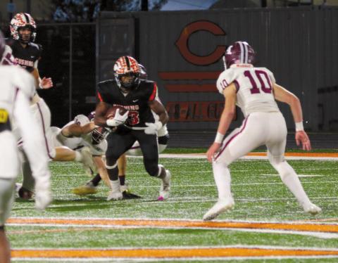 Cushing running back Noah Jones sets a defender up for an ankle break. Jones rushed for 121 yards and two touchdowns Friday during the Tigers’ 63-14 win over Ada.