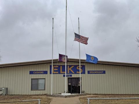 Flags at the Cushing-Drumright Elks Lodge fly at half mast during the snow storm Sunday, Jan. 5. Photo by Allie Prater